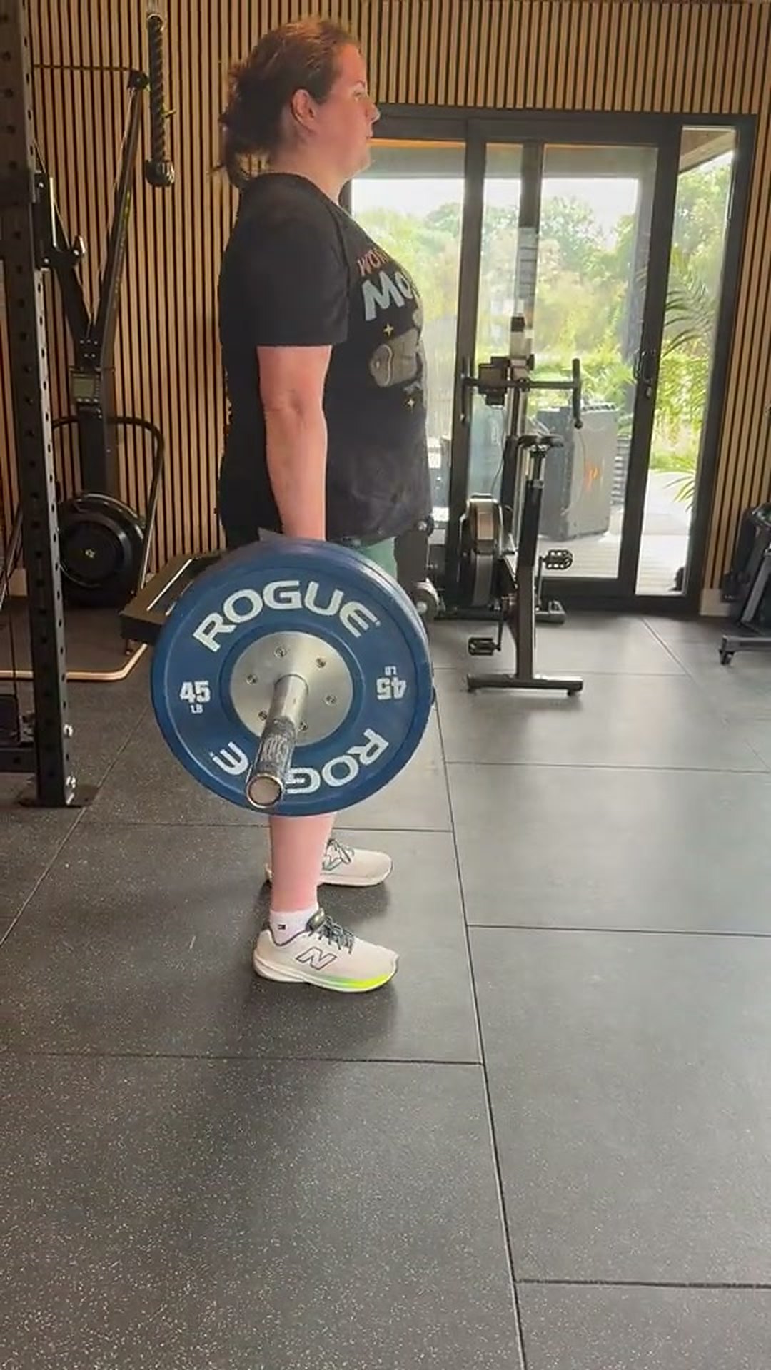 A Workshop client lifting a barbell deadlift in the Cobham studio