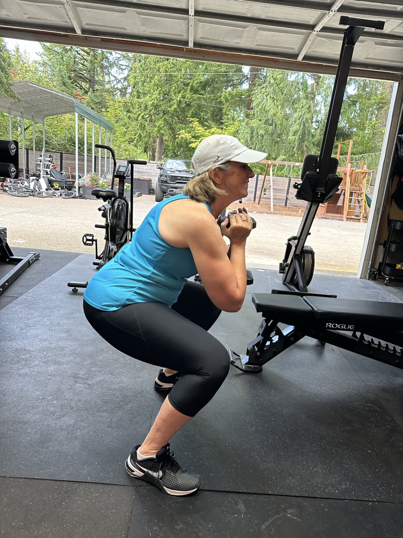 Adult client goblet squat training